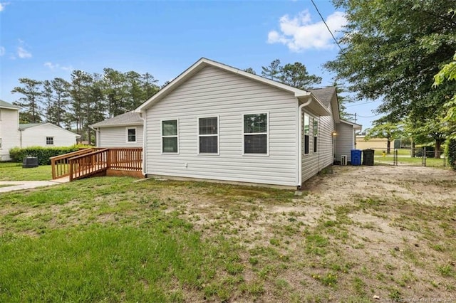 325 Hamilton St, Fayetteville, NC 28301 - rear view of house featuring a wooden deck and a yard