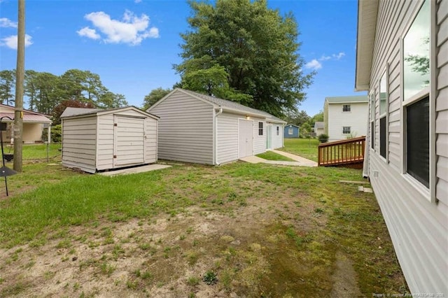 325 Hamilton St, Fayetteville, NC 28301 - view of green lawn featuring a storage unit