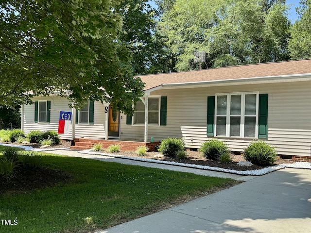 835 Pearleman Teague Rd, Siler City, NC 27344 - manufactured / mobile home featuring crawl space, a front lawn, and a shingled roof