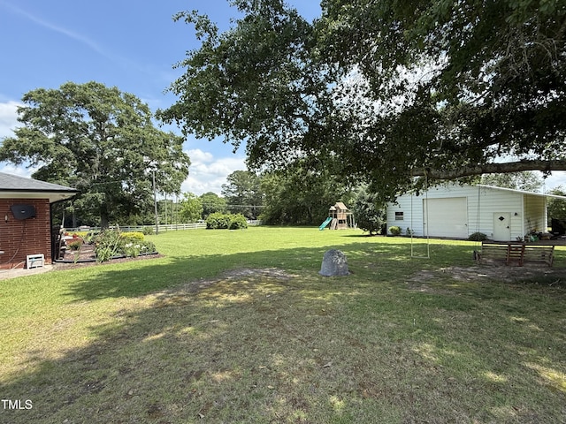 12082 NC-42, Fuquay Varina, NC 27526 - view of yard featuring a playground and an outdoor structure