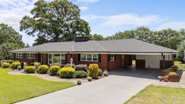 12082 NC-42, Fuquay Varina, NC 27526 - ranch-style house with an attached carport, brick siding, driveway, a front yard, and a shingled roof