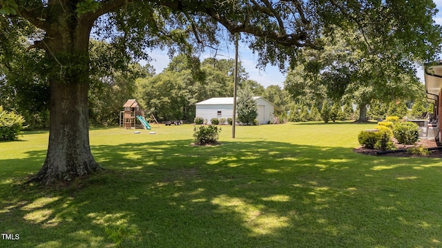 12082 NC-42, Fuquay Varina, NC 27526 - view of green lawn with a playground