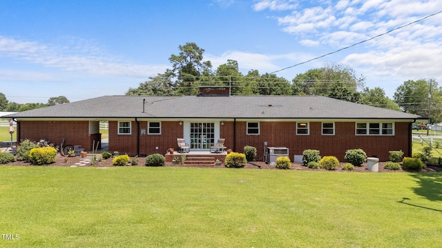 12082 NC-42, Fuquay Varina, NC 27526 - back of property featuring a lawn and brick siding