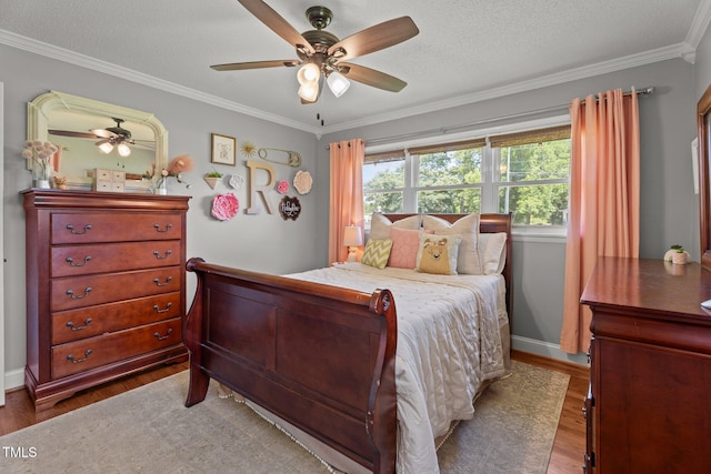 12082 NC-42, Fuquay Varina, NC 27526 - bedroom with wood finished floors, crown molding, ceiling fan, and a textured ceiling