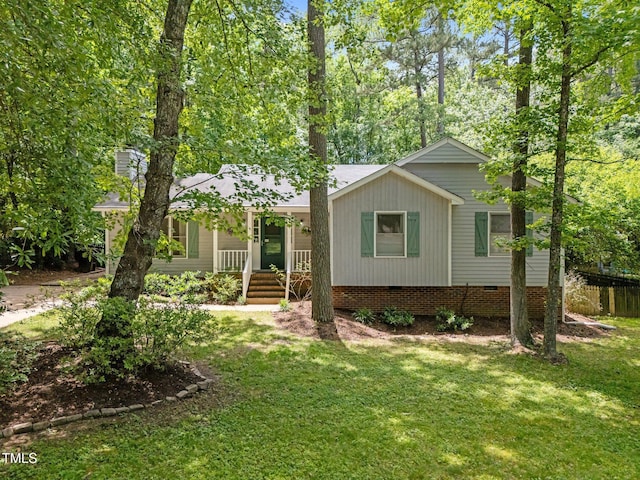 3007 Appling Way, Durham, NC 27703 - view of front facade with a porch, a front lawn, and crawl space