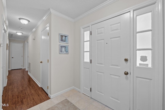 3007 Appling Way, Durham, NC 27703 - foyer entrance featuring crown molding, a textured ceiling, and light tile patterned flooring