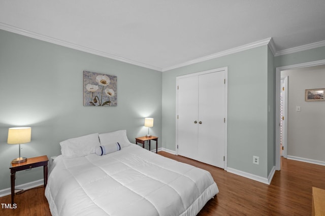 3007 Appling Way, Durham, NC 27703 - bedroom featuring wood finished floors, crown molding, and a closet