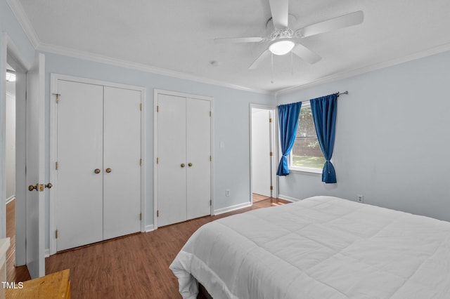 3007 Appling Way, Durham, NC 27703 - bedroom with wood finished floors, multiple closets, ornamental molding, and ceiling fan