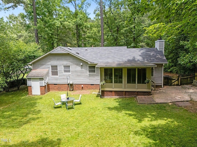 3007 Appling Way, Durham, NC 27703 - rear view of house featuring a chimney, crawl space, a sunroom, and roof with shingles