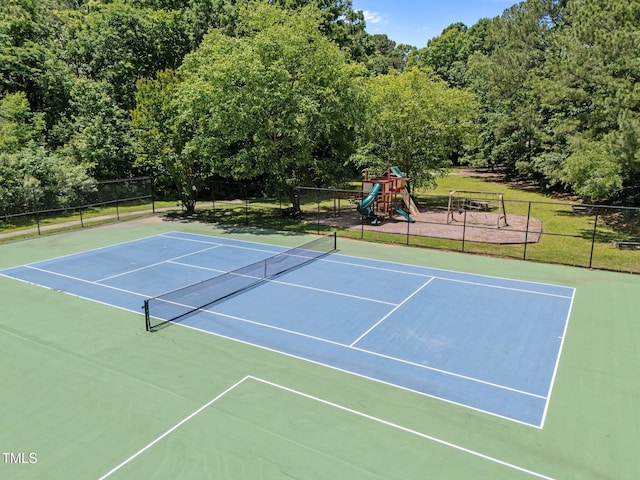 3007 Appling Way, Durham, NC 27703 - view of tennis court with community basketball court and a view of trees
