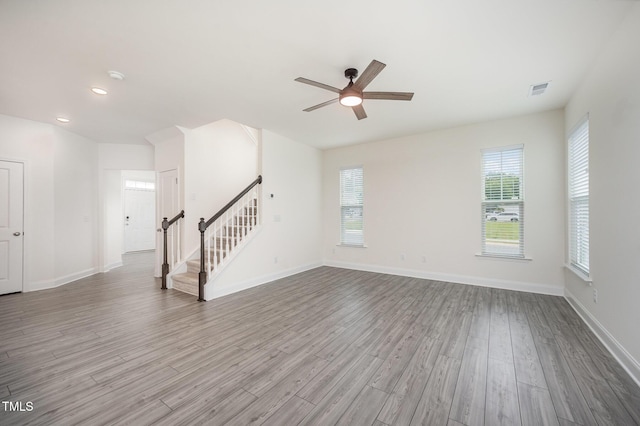 80 Nailsworth St, Angier, NC 27501 - unfurnished living room featuring stairs, ceiling fan, wood finished floors, and recessed lighting
