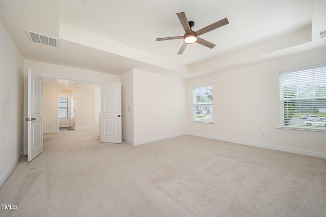 80 Nailsworth St, Angier, NC 27501 - spare room with light carpet, ceiling fan, and healthy amount of natural light