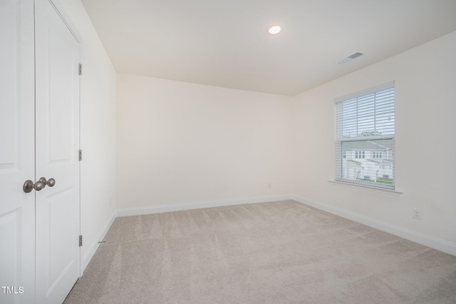 80 Nailsworth St, Angier, NC 27501 - unfurnished bedroom with light colored carpet, recessed lighting, and a closet