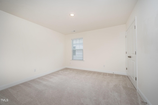 80 Nailsworth St, Angier, NC 27501 - empty room featuring light colored carpet and recessed lighting