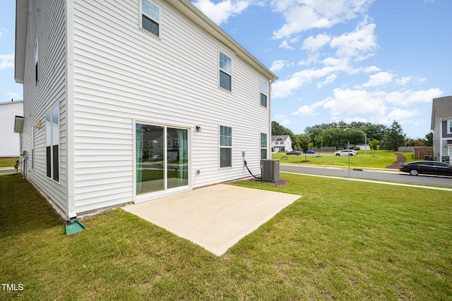 80 Nailsworth St, Angier, NC 27501 - back of house featuring a lawn and a patio