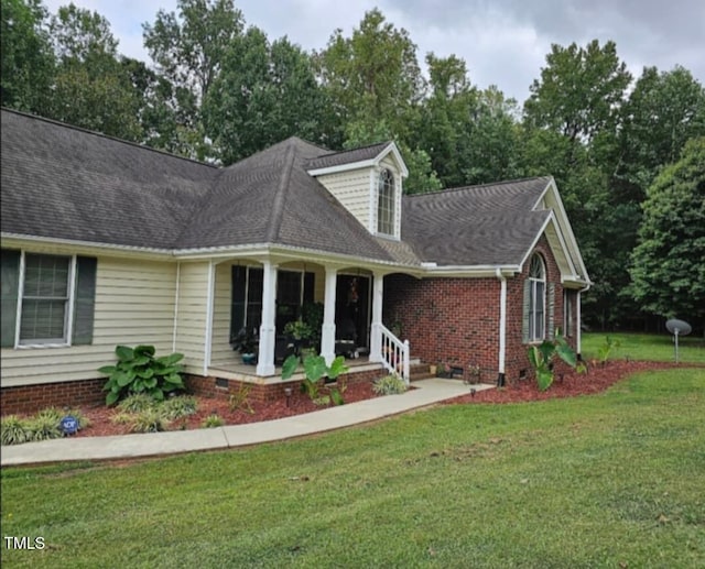 100 Deer Ridge Rd, Siler City, NC 27344 - view of front of home with a front lawn, crawl space, and a shingled roof