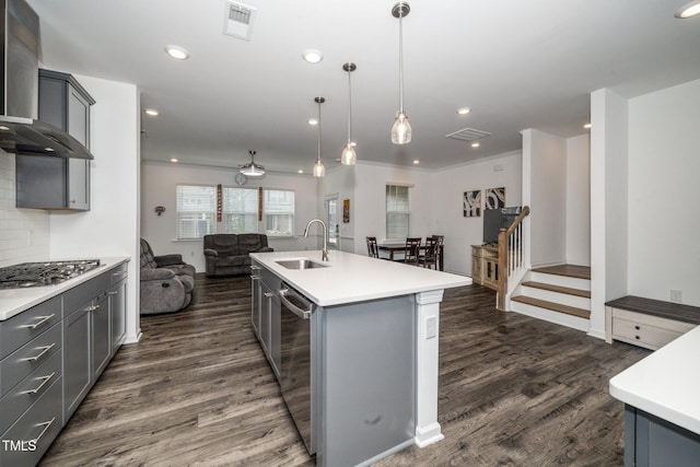 937 Baldwin Ridge Rd, Apex, NC 27523 - kitchen featuring wall chimney exhaust hood, gray cabinetry, open floor plan, dark wood-style flooring, and recessed lighting