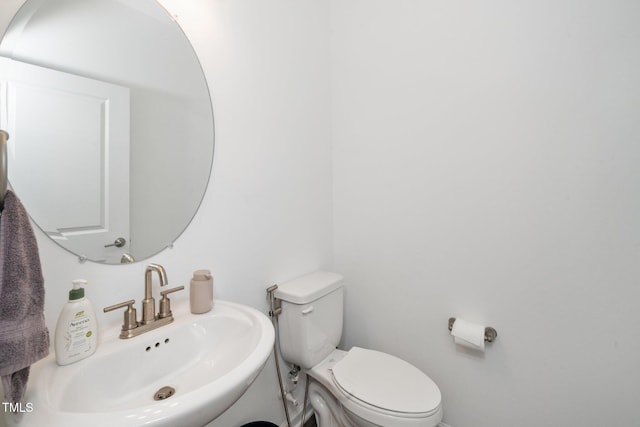 937 Baldwin Ridge Rd, Apex, NC 27523 - bathroom featuring a sink and toilet