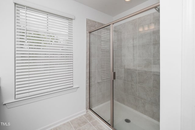 937 Baldwin Ridge Rd, Apex, NC 27523 - bathroom with a stall shower and tile patterned floors