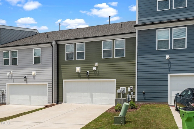 937 Baldwin Ridge Rd, Apex, NC 27523 - rear view of house featuring a garage and driveway