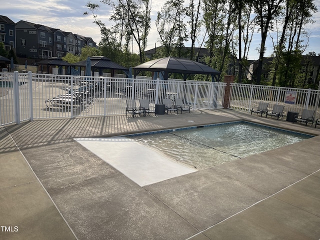 937 Baldwin Ridge Rd, Apex, NC 27523 - community pool with a gazebo, a residential view, and a patio area