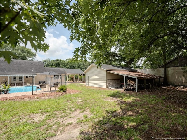 1554 Locklear Rd, Pembroke, NC 28372 - view of yard featuring a carport