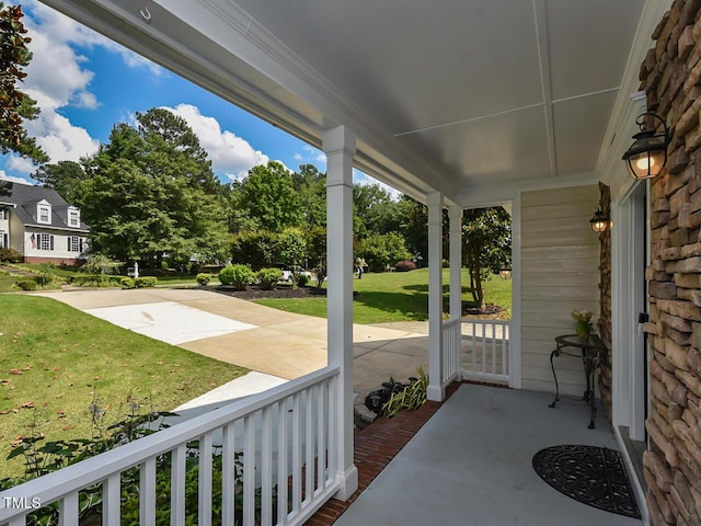 1005 Fairfax Woods Dr, Apex, NC 27502 - covered porch with a yard