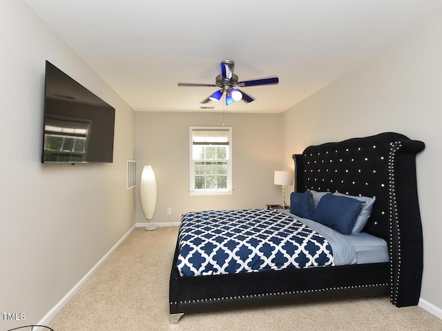 1005 Fairfax Woods Dr, Apex, NC 27502 - carpeted bedroom featuring baseboards and ceiling fan