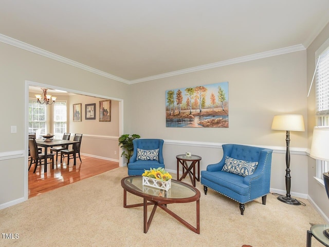1005 Fairfax Woods Dr, Apex, NC 27502 - sitting room featuring a chandelier, ornamental molding, and carpet floors