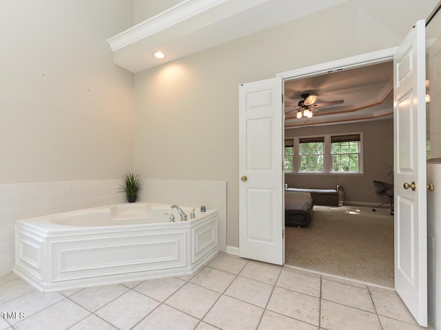 1005 Fairfax Woods Dr, Apex, NC 27502 - bathroom with a bath, tile patterned floors, and ceiling fan