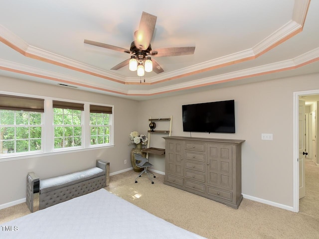1005 Fairfax Woods Dr, Apex, NC 27502 - bedroom featuring a tray ceiling, ornamental molding, carpet flooring, and a ceiling fan