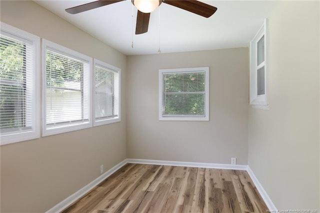 106 N 3rd St, Maxton, NC 28364 - spare room with light wood finished floors and ceiling fan