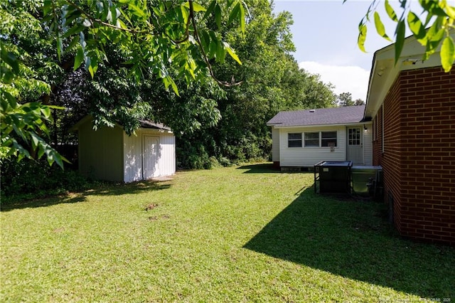 106 N 3rd St, Maxton, NC 28364 - view of green lawn with a storage shed