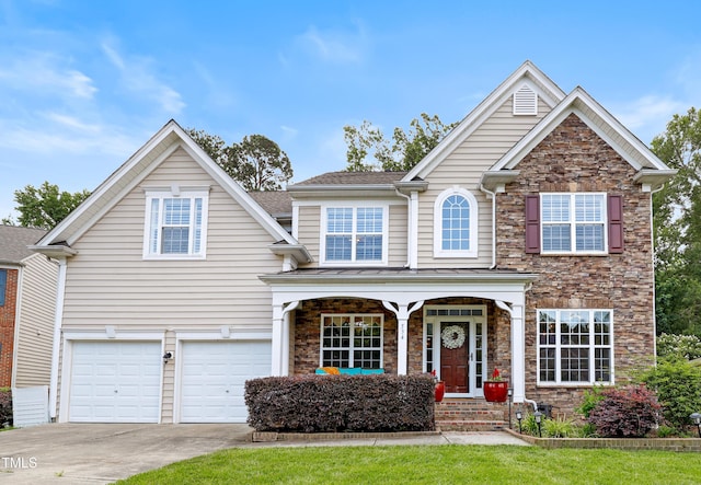 534 Siltstone Pl, Cary, NC 27519 - traditional-style house with concrete driveway, a garage, and stone siding