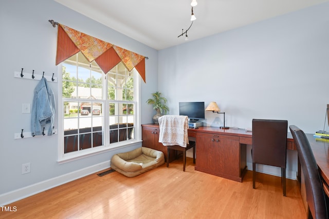 534 Siltstone Pl, Cary, NC 27519 - office area with light wood-style floors and baseboards