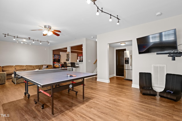 534 Siltstone Pl, Cary, NC 27519 - game room with track lighting, light wood-type flooring, and ceiling fan