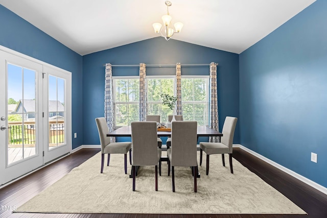 3504 Regent Pines Dr, New Hill, NC 27562 - dining room featuring a chandelier, vaulted ceiling, and dark wood-type flooring