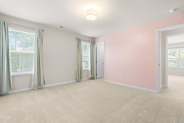 3504 Regent Pines Dr, New Hill, NC 27562 - spare room with a smoke detector and light colored carpet