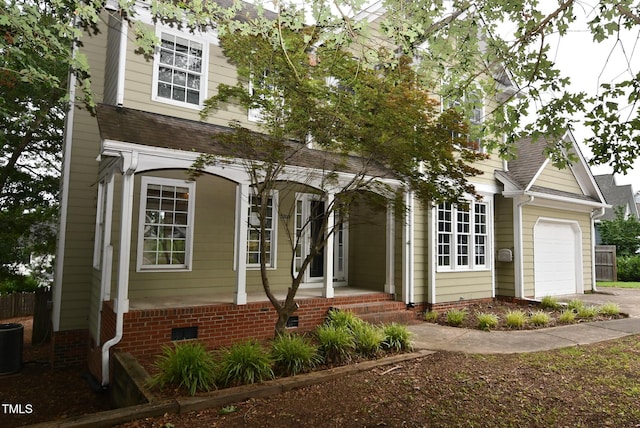 3209 Leebrook Rd, Raleigh, NC 27616 - view of front of property with covered porch, a garage, crawl space, roof with shingles, and driveway