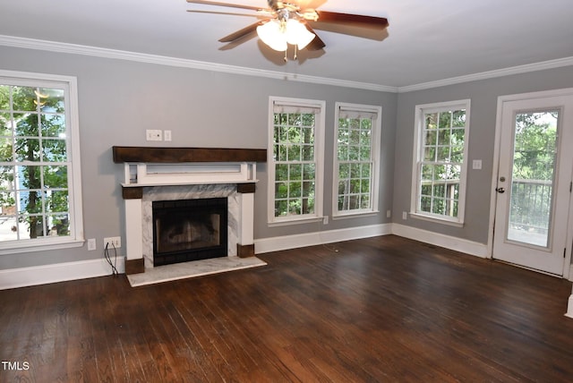 3209 Leebrook Rd, Raleigh, NC 27616 - unfurnished living room featuring hardwood / wood-style flooring, a fireplace, ceiling fan, healthy amount of natural light, and ornamental molding