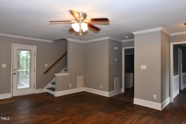 3209 Leebrook Rd, Raleigh, NC 27616 - unfurnished living room featuring ceiling fan, hardwood / wood-style flooring, stairway, and ornamental molding