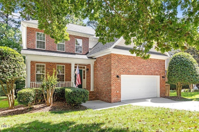 3921 Robins Nest Ln, Wake Forest, NC 27587 - traditional-style house with brick siding, concrete driveway, a porch, and a front lawn