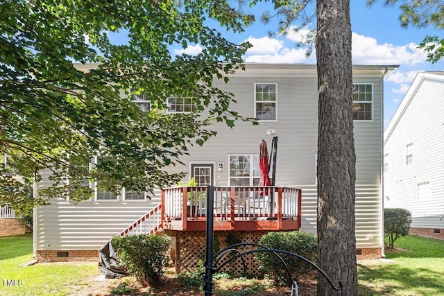 3921 Robins Nest Ln, Wake Forest, NC 27587 - rear view of house with crawl space, a wooden deck, and a lawn