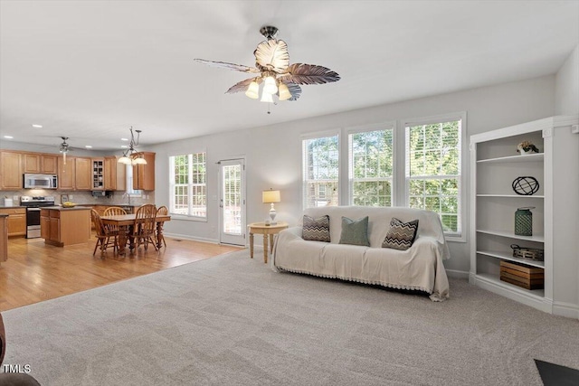3921 Robins Nest Ln, Wake Forest, NC 27587 - living area with ceiling fan, light carpet, and recessed lighting