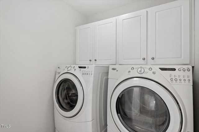 3921 Robins Nest Ln, Wake Forest, NC 27587 - washroom featuring cabinet space and independent washer and dryer