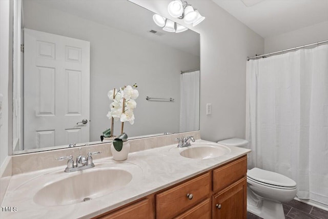 3921 Robins Nest Ln, Wake Forest, NC 27587 - bathroom featuring double vanity and a shower with shower curtain