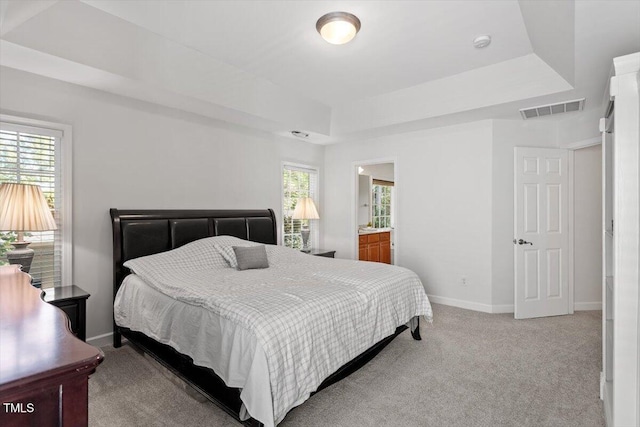 3921 Robins Nest Ln, Wake Forest, NC 27587 - bedroom with a tray ceiling and light colored carpet