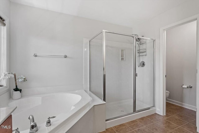 3921 Robins Nest Ln, Wake Forest, NC 27587 - bathroom with a shower stall and a bath