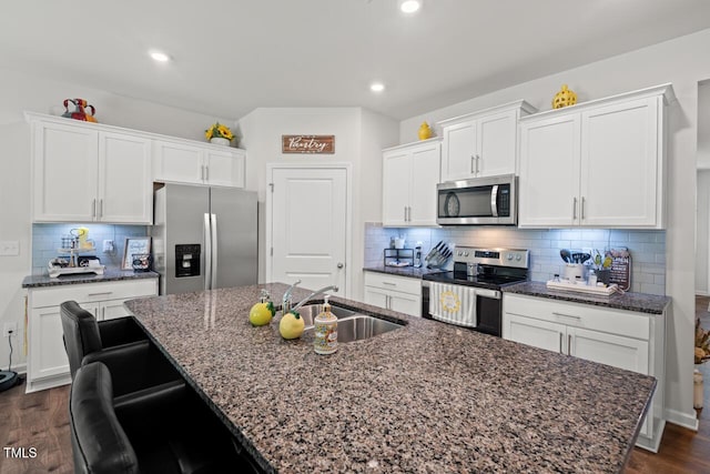 2730 Spring Valley Dr, Creedmoor, NC 27522 - kitchen featuring stainless steel appliances, an island with sink, white cabinetry, and recessed lighting