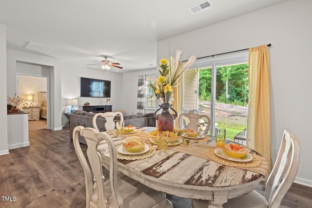 2730 Spring Valley Dr, Creedmoor, NC 27522 - dining space with dark wood finished floors and a ceiling fan